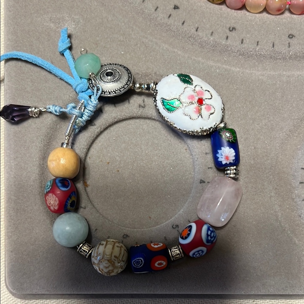 Colorful Beaded Bracelet with Floral Charm